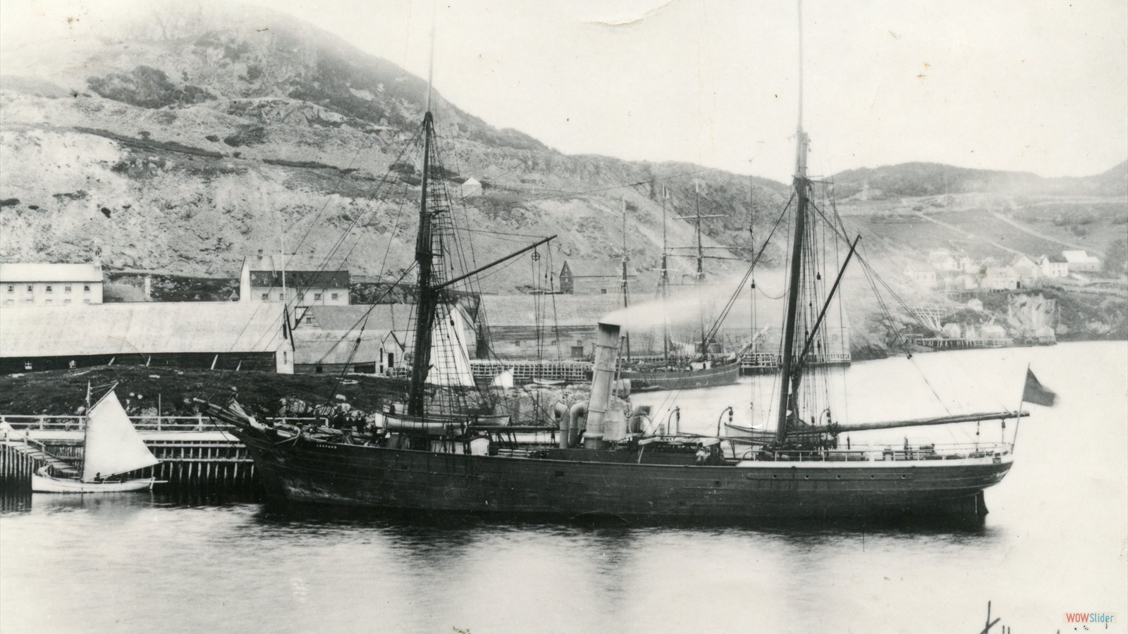 S.S. Leopard at the Government Wharf - the east coast mail and passenger service vessel; the Trinity West ferry to the left of the photo, Lester-Garland Premises in the background